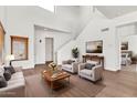 Inviting living room featuring hardwood floors, comfortable seating, and stylish decor, offering a relaxing atmosphere at 544 N Alma School Rd # 28, Mesa, AZ 85201