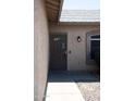 Close up of the house's secure front door and adjacent window at 749 N 99Th St, Mesa, AZ 85207