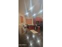 Kitchen has dark granite countertops, cherry cabinets and stainless steel appliances at 7521 S 31St Pl, Phoenix, AZ 85042