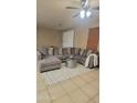 Spacious living room features sectional sofa and neutral decor at 7521 S 31St Pl, Phoenix, AZ 85042