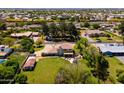 Aerial view of the house showcasing a large, well-maintained backyard and patio with seating at 10532 W Catalina Dr, Avondale, AZ 85392