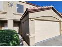 Charming townhome with a two-car garage and desert landscaping at 125 S 56Th St # 75, Mesa, AZ 85206