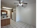 Open kitchen layout featuring granite countertops and an adjacent dining area at 1633 E Lakeside Dr # 39, Gilbert, AZ 85234