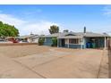 Charming single story home with manicured landscaping and inviting curb appeal at 2144 W 1St Pl, Mesa, AZ 85201