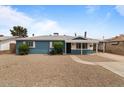 Charming single story home with manicured landscaping and inviting curb appeal at 2144 W 1St Pl, Mesa, AZ 85201