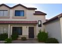 Charming townhome featuring a red tile roof and cozy front entrance at 2941 N Oregon St # 12, Chandler, AZ 85225