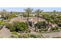 Luxurious home featuring lush landscaping, fountain, and private entrance at 5615 N Invergordon Rd, Paradise Valley, AZ 85253