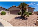 Attractive single-Gathering house featuring a well-kept yard and convenient two-car garage at 1245 E Emile Zola Ave, Phoenix, AZ 85022