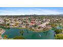 Stunning aerial view of the lakeside community, showcasing lush landscaping and mountain views at 1896 E Stephens Dr, Tempe, AZ 85283