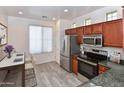 A view of the kitchen with stainless steel appliances and granite countertops at 21050 E Tierra Grande --, Queen Creek, AZ 85142