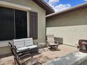 Relaxing outdoor patio with comfortable seating, perfect for enjoying the beautiful weather at 27158 W Potter Dr, Buckeye, AZ 85396