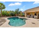 Backyard features a private swimming pool with a baja shelf and ample patio space at 4809 E Red Range Way, Cave Creek, AZ 85331