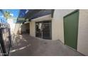 Charming patio with concrete floor, pergola, and privacy fencing, perfect for outdoor relaxation at 520 S Evergreen Rd, Tempe, AZ 85288