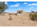 A charming single story home with a desert landscaped front yard and visible mailbox at 633 S 96Th St, Mesa, AZ 85208