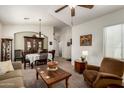 Inviting living and dining area featuring neutral walls and plush carpeting at 1022 N Kirby St, Gilbert, AZ 85234