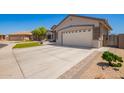 Well-maintained home with a spacious driveway and a two-car garage at 2839 S Copperwood --, Mesa, AZ 85212