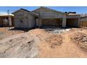 Home under construction with scaffolding, showcasing the building's structure and progress at 46887 W Old Timer Rd, Maricopa, AZ 85139