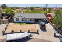 Charming single-story home with covered parking and a spacious driveway, offering convenience and curb appeal at 6501 W Columbus Ave, Phoenix, AZ 85033