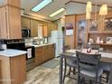 Functional kitchen with modern appliances and a dining area for easy meals and entertaining at 7750 E Broadway Rd # 774, Mesa, AZ 85208