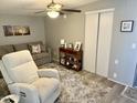 Inviting living space with a comfortable sofa, recliner, and stylish decor accents at 7750 E Broadway Rd # 774, Mesa, AZ 85208