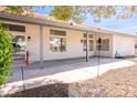 Covered patio with tile roofing, offering a spacious area for outdoor living and entertaining at 1642 E Palm Beach Dr, Chandler, AZ 85249