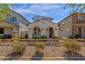 Charming single-Gathering home with a cozy front porch and well-maintained landscaping at 3828 S Verbena Ave, Gilbert, AZ 85297