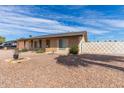 Single-story home featuring desert landscaping with a gravel yard at 4106 W Mission Ln, Phoenix, AZ 85051