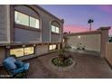 Private backyard featuring brick pavers, potted plants, seating area and lots of natural light at 5004 W Kaler Dr, Glendale, AZ 85301