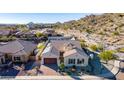 This elevated aerial view showcases the desert landscaping of this charming property at 14552 S 182Nd Dr, Goodyear, AZ 85338