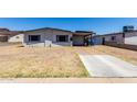 Inviting single-story home with a covered parking area, perfect for easy access and weather protection at 14823 N 29Th Ave, Phoenix, AZ 85053