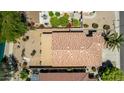 Aerial view showcases the property's tile roof, private backyard, and landscaping, offering a bird's eye perspective at 19942 N 108Th Ave, Peoria, AZ 85373