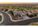 A high angle view of a residential community featuring attractive single-story homes with desert landscaping at 20506 N 271St Ave, Buckeye, AZ 85396