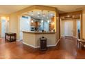 Spacious kitchen with wood cabinetry, granite countertops, and pendant lighting at 20506 N 271St Ave, Buckeye, AZ 85396
