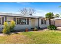 Attractive single-level home with neat landscaping and a welcoming entrance at 3243 E Sheridan St, Phoenix, AZ 85008