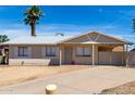 Charming single-story home with a well-maintained front yard and desert landscaping at 4636 W Mission Ln, Glendale, AZ 85302