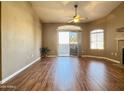 Sun-filled living room with wood floors, a ceiling fan, and access to a patio, great for relaxing at 5335 E Shea Blvd # 2045, Scottsdale, AZ 85254