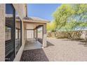 Spacious backyard featuring a covered patio, providing ample space for outdoor enjoyment at 5926 W Questa Dr, Glendale, AZ 85310