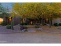 Charming front entrance with desert landscaping and mature trees at 8300 E Lone Mountain Rd, Scottsdale, AZ 85266