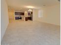 Bright and airy living room with tile flooring, ample natural light, and an open layout at 1130 E Atwood Dr, Casa Grande, AZ 85122