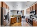Spacious kitchen with stainless steel appliances, tile floors, and an eat-in dining area at 1265 S Aaron -- # 277, Mesa, AZ 85209