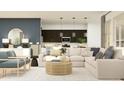 Open-concept living room featuring a stylish sofa, comfortable chairs, and modern lighting, creating an inviting atmosphere at 16934 W Bronco Trl, Surprise, AZ 85387