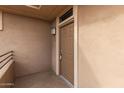 A well-lit front entrance featuring a secure, solid door, offering a welcoming and private entry at 20100 N 78Th N Pl # 3212, Scottsdale, AZ 85255