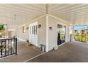 Inviting covered porch featuring double-door entry, stylish decor, and covered awning at 2650 W Union Hills Dr # 100, Phoenix, AZ 85027