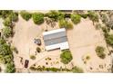 An aerial view of the home and surrounding natural desert landscape at 33852 N 52Nd St, Cave Creek, AZ 85331