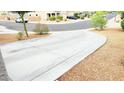Long driveway leading to the street at 3402 N 300Th Dr, Buckeye, AZ 85396