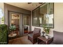 Cozy covered patio featuring comfortable seating, offering a private outdoor retreat at 4120 N 78Th St # 216, Scottsdale, AZ 85251