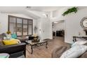 Open-concept living room showcasing natural light and stylish decor at 654 W Fremont Dr, Tempe, AZ 85282