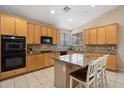 Well-appointed kitchen featuring ample counter space, cabinetry, and modern appliances at 7438 E Glenn Moore Rd, Scottsdale, AZ 85255