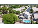 Spacious backyard with mature trees, private pool, covered patio area and a private fence at 8228 S Stephanie Ln, Tempe, AZ 85284