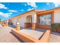 Attractive home with front brickwork, ample parking, and a tidy, low-maintenance landscape at 8255 E Kiva Ave # 422, Mesa, AZ 85209